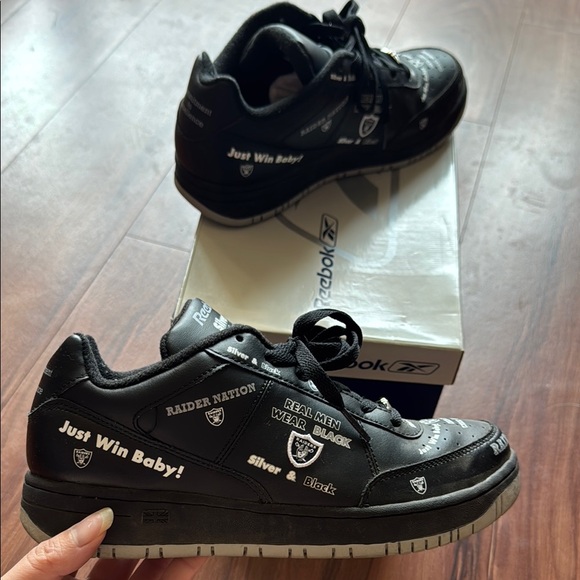 Reebok Shoes - Reebok Black and Silver Raiders Athletic Shoes